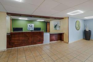 an empty office with a reception desk in a room at Quality Inn - Denton in Denton