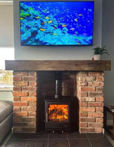 TV a/nebo společenská místnost v ubytování Ocean View, Portstewart