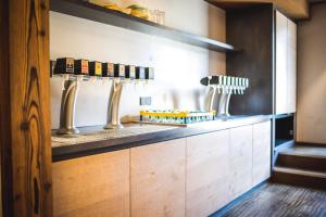 Kuchyň nebo kuchyňský kout v ubytování Familotel Alphotel