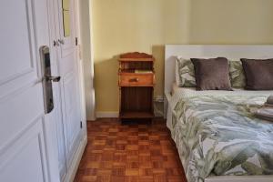Postel nebo postele na pokoji v ubytování Ljmonade Hostel