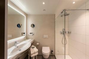 Ein Badezimmer in der Unterkunft Insel-Hotel Heilbronn