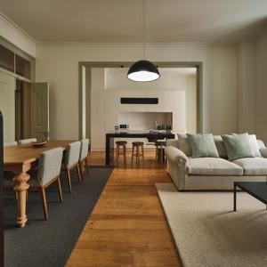 a living room with a couch and a table at Look Living, Lisbon Design Apartments in Lisbon