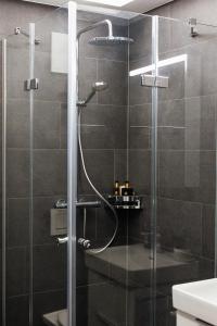 Koupelna v ubytování Lamira - Serviced Apartments