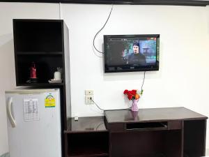 Kuchyň nebo kuchyňský kout v ubytování Lamai Apartment