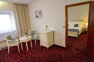 Posteľ alebo postele v izbe v ubytovaní Hotel Galant Lednice