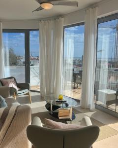 Khu vực ghế ngồi tại Fuseta Apartments, Vista Mar - Penthouse