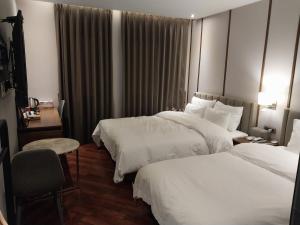 Postel nebo postele na pokoji v ubytování Brown Dot Hotel Busan Station