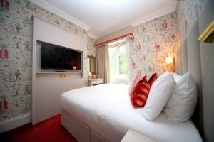 Postel nebo postele na pokoji v ubytování Kilronan House