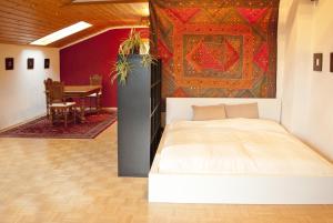Ένα ή περισσότερα κρεβάτια σε δωμάτιο στο Apartment Hufnagl