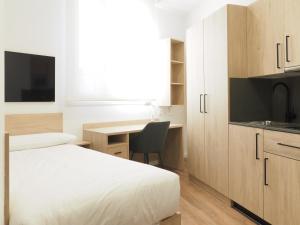 Postel nebo postele na pokoji v ubytování Micampus San Mamés Students Residence