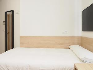 Postel nebo postele na pokoji v ubytování Micampus San Mamés Students Residence