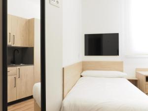 TV a/nebo společenská místnost v ubytování Micampus San Mamés Students Residence