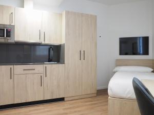 Kuchyň nebo kuchyňský kout v ubytování Micampus San Mamés Students Residence