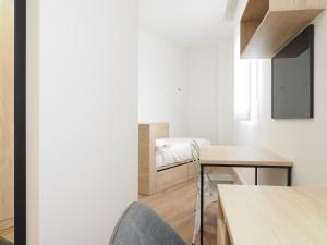 Postel nebo postele na pokoji v ubytování Micampus San Mamés Students Residence