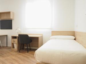Postel nebo postele na pokoji v ubytování Micampus San Mamés Students Residence