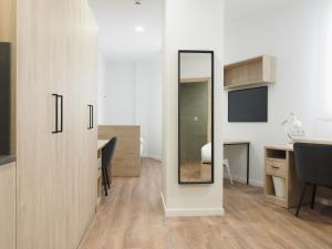 TV a/nebo společenská místnost v ubytování Micampus San Mamés Students Residence