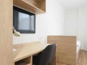 TV a/nebo společenská místnost v ubytování Micampus San Mamés Students Residence