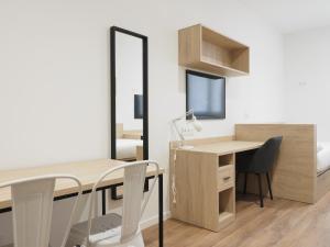 TV a/nebo společenská místnost v ubytování Micampus San Mamés Students Residence