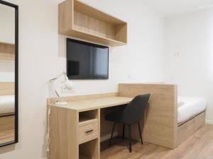 TV a/nebo společenská místnost v ubytování Micampus San Mamés Students Residence