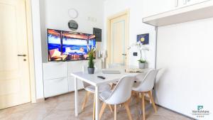 TV o dispositivi per l'intrattenimento presso Vento Mare Apartments