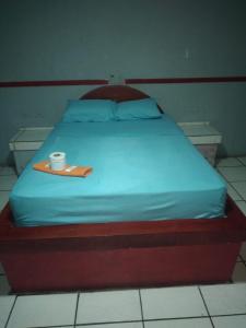 Cama o camas de una habitación en HOTEL LAS CAPERUZAS