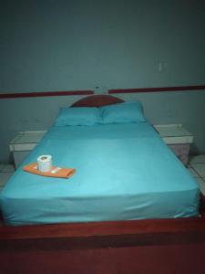 Cama o camas de una habitación en HOTEL LAS CAPERUZAS