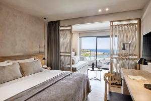 Postel nebo postele na pokoji v ubytování Helea Lifestyle Beach Resort