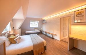 Postel nebo postele na pokoji v ubytování Guesthouse Brouwershuis