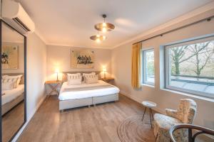 Postel nebo postele na pokoji v ubytování Guesthouse Brouwershuis