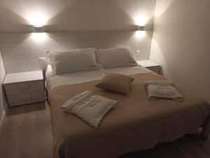 GrassanoにあるA Due Passiのベッドルーム1室(枕2つ付)
