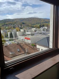 a view of a city from a window at Apartman Centar Travnik in Travnik