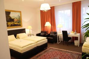 Postel nebo postele na pokoji v ubytování Hotel Adler