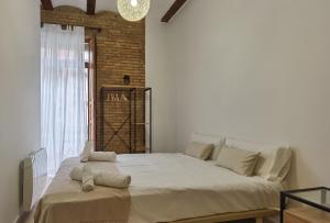 Posteľ alebo postele v izbe v ubytovaní Enjoy Apartment 4 pax at Ruzafa with sunny terrace
