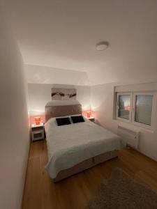 Ένα ή περισσότερα κρεβάτια σε δωμάτιο στο Carpe diem Zlatar