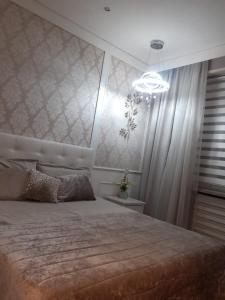Postel nebo postele na pokoji v ubytování Torino house- vicino-pala Alpitour -centro