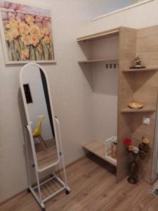 a dressing room with a mirror and a shelf at Guest House, Old-Si in Tbilisi City