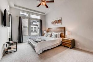 a bedroom with a bed and a ceiling fan at Fam Friendly 5 Bed Home Blocks To Pearl/Riverwalk! in San Antonio
