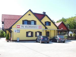a building with a sign on the front of it at Hotel Pri Belokranjcu in Novo Mesto