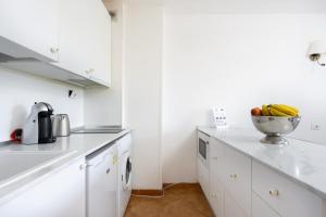 A kitchen or kitchenette at Seafront studio with beach view in the center of Los Cristianos