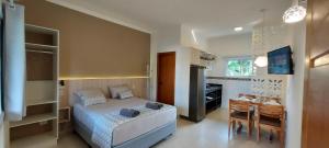 Postel nebo postele na pokoji v ubytování Solarium Flats Itagua Próximo ao Aquário e a Praça da Baleia