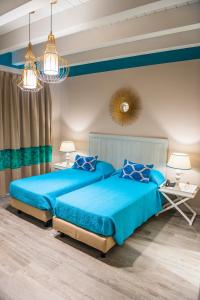Posteľ alebo postele v izbe v ubytovaní Hotel San Michele