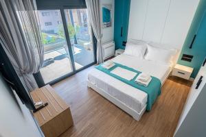 A&N Athens Luxury Apartments - Akadimou客房内的一张或多张床位