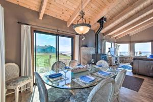 a dining room with a table and chairs at Spectacular Ocean View Retreat with Private Beach in Manchester