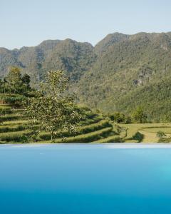 The swimming pool at or close to Pù Luông Ecolodge