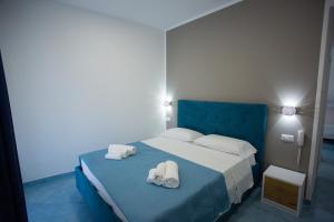 Postel nebo postele na pokoji v ubytování Hotel da Alfredo
