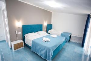 Postel nebo postele na pokoji v ubytování Hotel da Alfredo