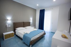 Postel nebo postele na pokoji v ubytování Hotel da Alfredo