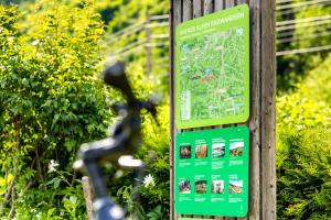 a sign for a garden with a map on it at Hubertushof in Trattenbach