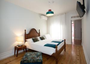 Cama ou camas em um quarto em VisHostel