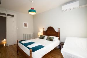 Cama ou camas em um quarto em VisHostel
